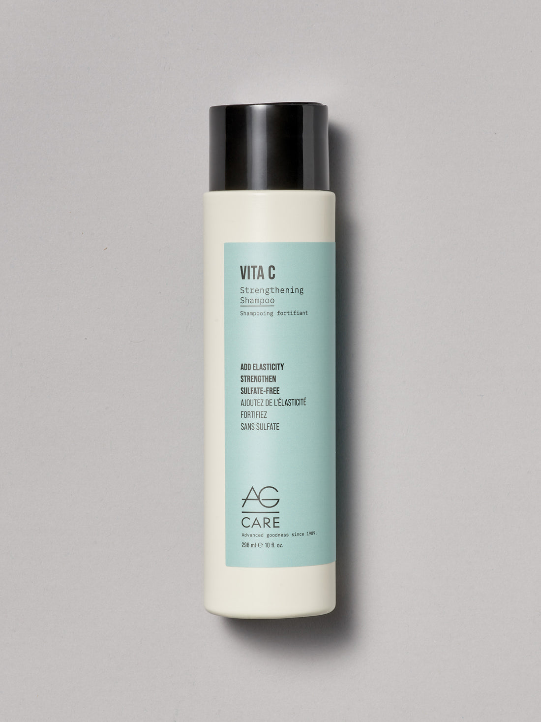 Vita C shampoo bottle by AG Care on a gray background