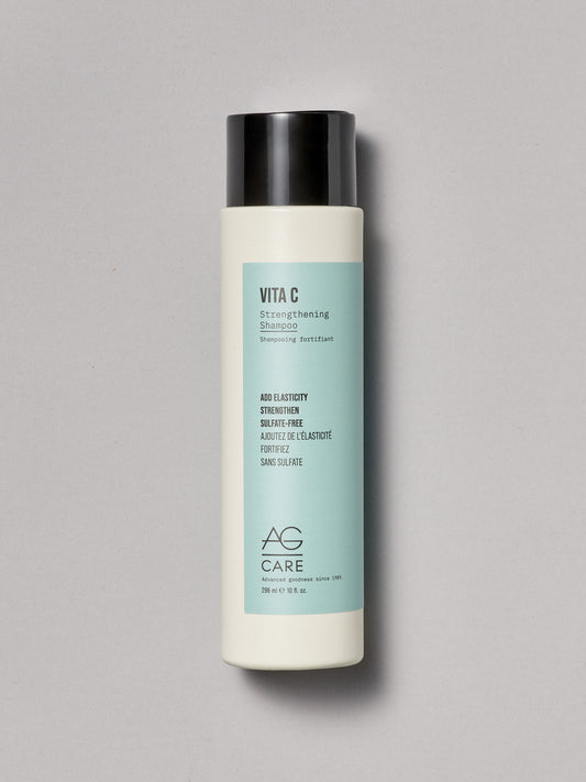 Vita C shampoo bottle by AG Care on a gray background