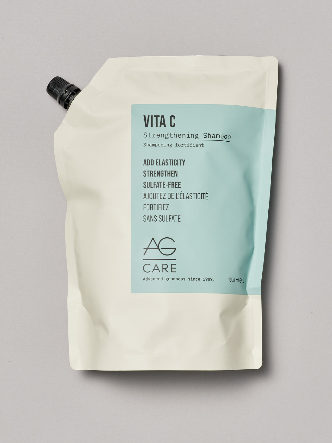 Vita C shampoo packaging on a gray background