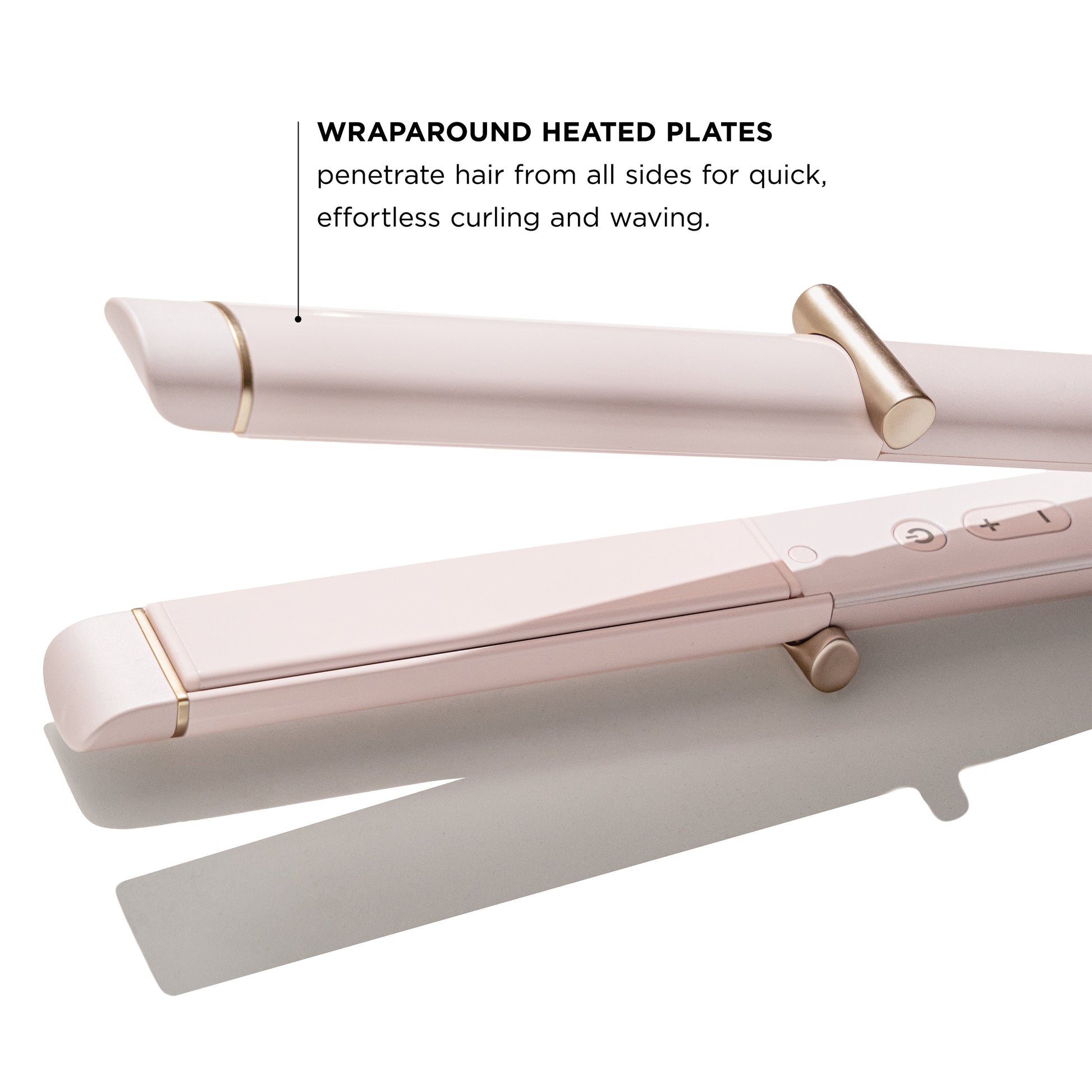 Pink hair straightener with gold accents on a white background