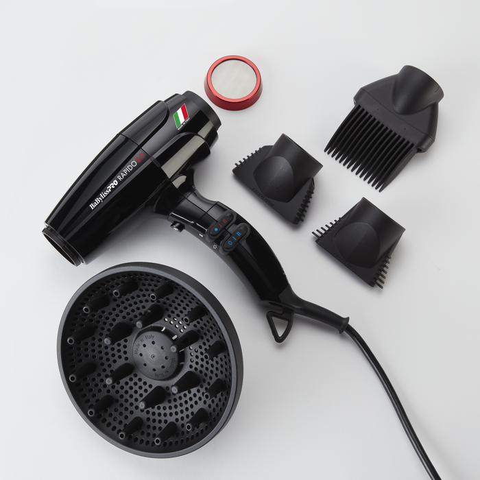 Black hair dryer with attachments on a white background