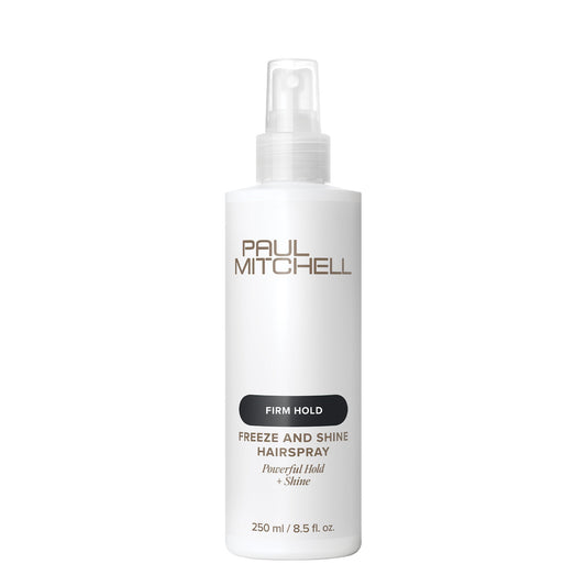 Bottle of Paul Mitchell Freeze and Shine Hairspray on a white background