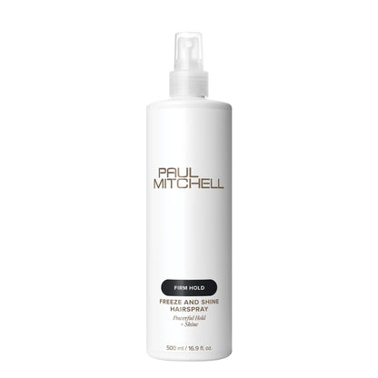 A 500 ml white bottle of Paul Mitchell Freeze and Shine Hairspray with a clear spray top, featuring brown and black text on a clean white background.