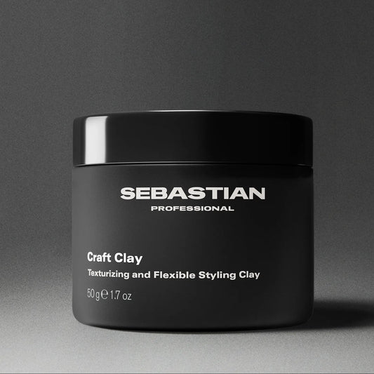 Black jar of Sebastian Professional Craft Clay on a gray background